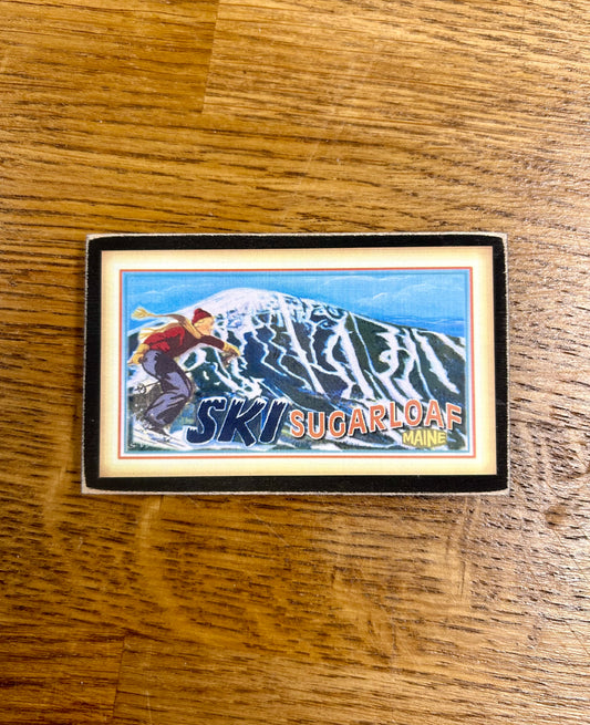 Sugarloaf&nbsp;is a year-round&nbsp;resort&nbsp;in Carrabassett Valley, Maine offering 1360 skiable acres. This souvenir is a magnet handmade by Gallery Concepts for all you Sugarloafers out there.