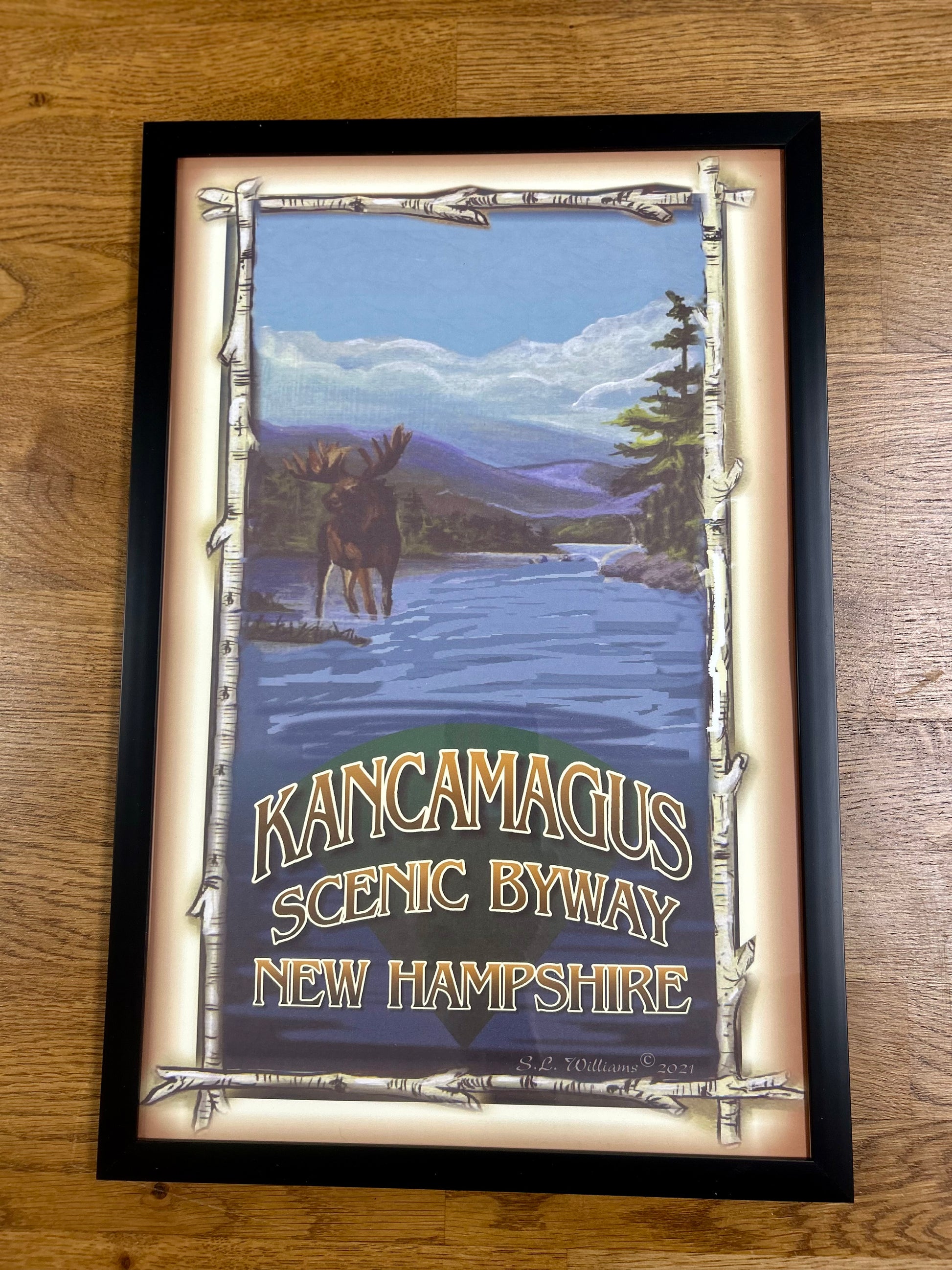 Kancamagus Scenic Highway souvenir depicting a Moose at the Swift River by Gallery Concepts. 