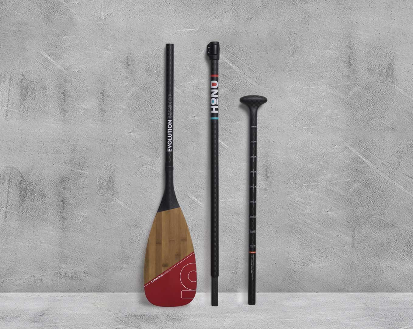 Evolution Bamboo Carbon Paddle 3 piece shown in Bright Coral color.