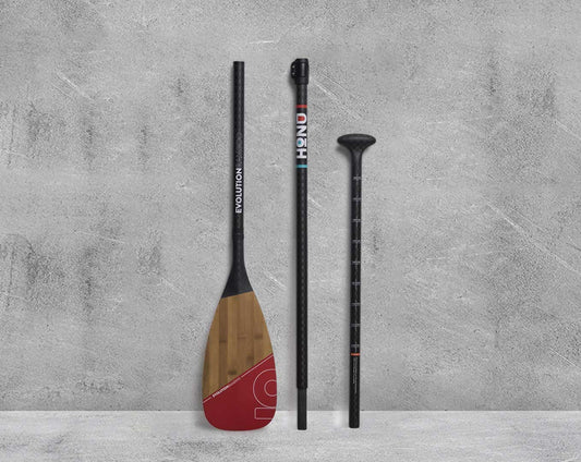 Evolution Bamboo Carbon Paddle 3 piece shown in Bright Coral color.